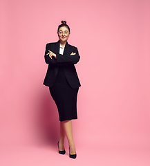 Image showing Young caucasian woman in office attire. Bodypositive female character. plus size businesswoman