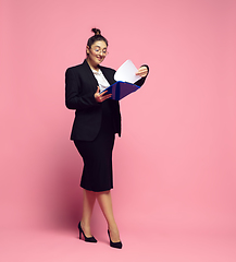 Image showing Young caucasian woman in office attire. Bodypositive female character. plus size businesswoman