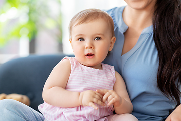 Image showing portrait of little baby girl with happy mother