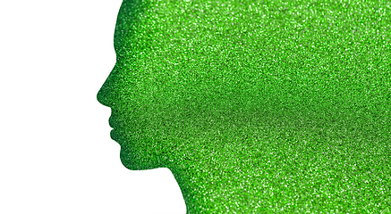 Image showing silhouette of woman face on green glitters