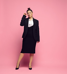 Image showing Young caucasian woman in office attire. Bodypositive female character. plus size businesswoman