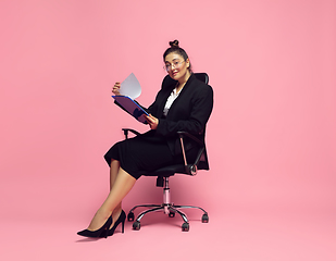 Image showing Young caucasian woman in office attire. Bodypositive female character. plus size businesswoman