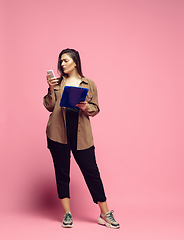 Image showing Young caucasian woman in casual wear. Bodypositive female character. plus size businesswoman