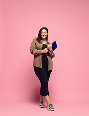 Image showing Young caucasian woman in casual wear. Bodypositive female character. plus size businesswoman