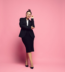 Image showing Young caucasian woman in office attire. Bodypositive female character. plus size businesswoman