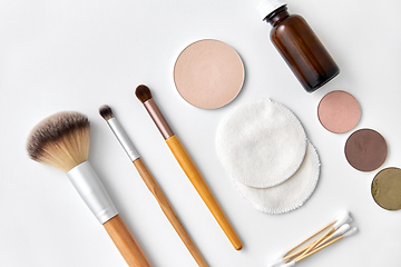 Image showing make up brushes, cosmetics and cotton swabs