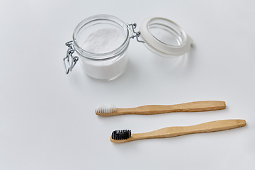 Image showing washing soda and wooden toothbrushes