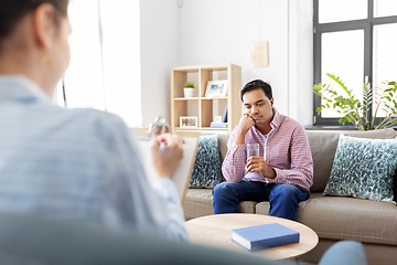 Image showing man and psychologist at psychotherapy session