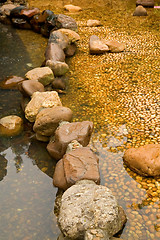 Image showing Stones at pond