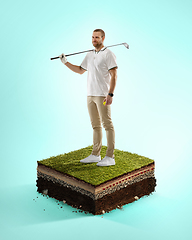 Image showing Golf player in a white shirt playing on blue background above stadium layers. Professional player practicing during gameplay, championship