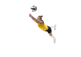 Image showing Young female volleyball player isolated on white studio background. Woman in sport\'s equipment training and practicing.