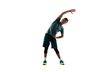 Image showing Young caucasian male model in action, motion isolated on white background. Concept of sport, movement, energy and dynamic, healthy lifestyle. Training, practicing.