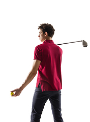 Image showing Golf player in a red shirt training, practicing isolated on white studio background