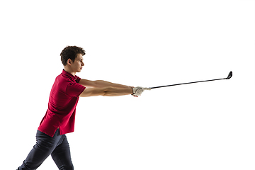 Image showing Golf player in a red shirt taking a swing isolated on white studio background