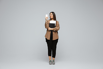 Image showing Young caucasian woman in casual wear. Bodypositive female character, plus size businesswoman