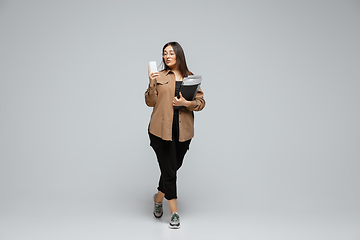 Image showing Young caucasian woman in casual wear. Bodypositive female character, plus size businesswoman