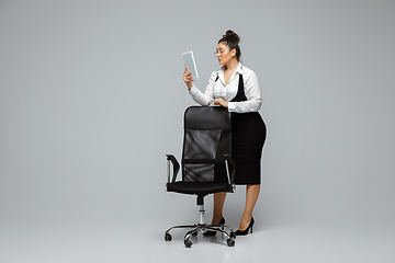 Image showing Young caucasian woman in office attire. Bodypositive female character. plus size businesswoman