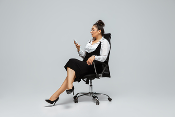 Image showing Young caucasian woman in office attire. Bodypositive female character. plus size businesswoman