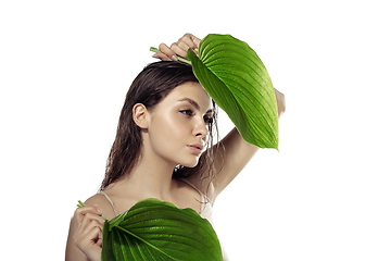 Image showing Close up of beautiful young woman over white background. Cosmetics and makeup, natural and eco treatment, skin care.