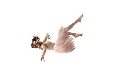 Image showing Mid-air beauty. Full length studio shot of attractive young woman hovering in air and keeping eyes closed