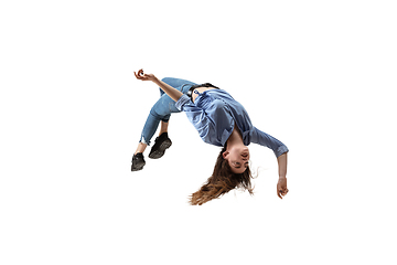 Image showing Mid-air beauty. Full length studio shot of attractive young woman hovering in air and keeping eyes closed