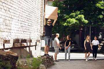 Image showing Dude with sign - man stands protesting things that annoy him