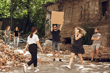 Image showing Dude with sign - man stands protesting things that annoy him