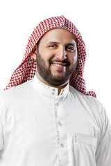 Image showing Smiling arabian man\'s portrait isolated on white studio background