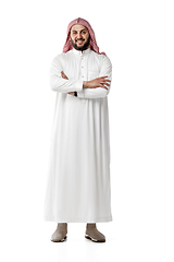 Image showing Smiling arabian man\'s portrait isolated on white studio background