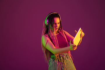 Image showing Portrait of young caucasian woman on pink background with copyspace, unusual and freaky appearance