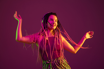 Image showing Portrait of young caucasian woman on pink background with copyspace, unusual and freaky appearance