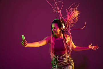 Image showing Portrait of young caucasian woman on pink background with copyspace, unusual and freaky appearance