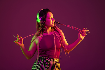 Image showing Portrait of young caucasian woman on pink background with copyspace, unusual and freaky appearance