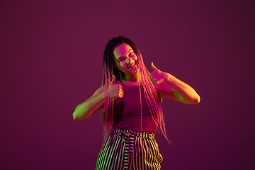 Image showing Portrait of young caucasian woman on pink background with copyspace, unusual and freaky appearance