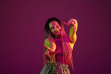 Image showing Portrait of young caucasian woman on pink background with copyspace, unusual and freaky appearance