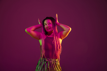 Image showing Portrait of young caucasian woman on pink background with copyspace, unusual and freaky appearance