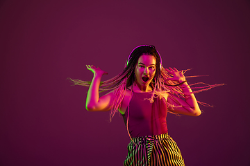 Image showing Portrait of young caucasian woman on pink background with copyspace, unusual and freaky appearance