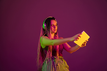 Image showing Portrait of young caucasian woman on pink background with copyspace, unusual and freaky appearance