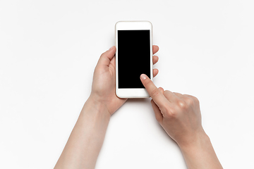 Image showing Close up of human hand using smartphone with blank black screen, education and business concept