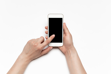 Image showing Close up of human hand using smartphone with blank black screen, education and business concept