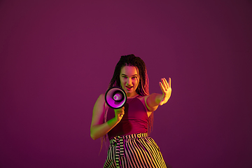 Image showing Portrait of young caucasian woman on pink background with copyspace, unusual and freaky appearance