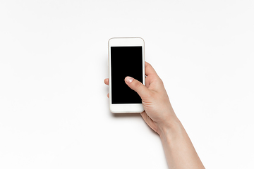 Image showing Close up of human hand using smartphone with blank black screen, education and business concept