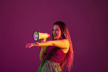 Image showing Portrait of young caucasian woman on pink background with copyspace, unusual and freaky appearance