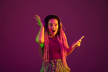 Image showing Portrait of young caucasian woman on pink background with copyspace, unusual and freaky appearance