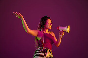 Image showing Portrait of young caucasian woman on pink background with copyspace, unusual and freaky appearance