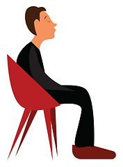 Image showing A young boy waiting for someone while sitting on a red lounge ch