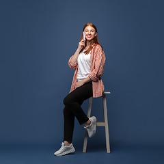 Image showing Young caucasian woman in casual wear. Bodypositive female character, plus size businesswoman