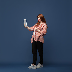 Image showing Young caucasian woman in casual wear. Bodypositive female character, plus size businesswoman