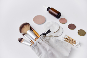 Image showing make up brushes, cosmetics and cotton swabs