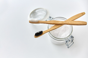 Image showing washing soda and wooden toothbrushes